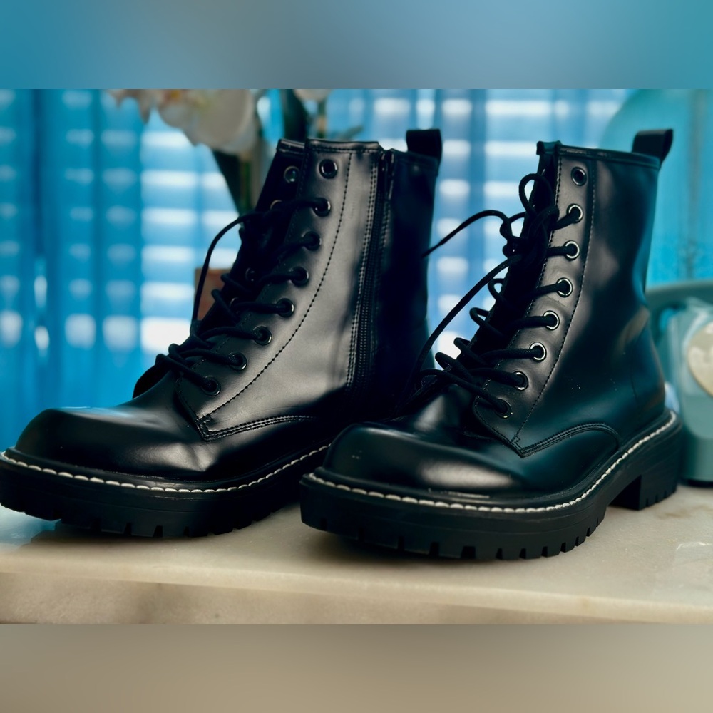 Black laced up boots